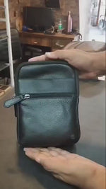 Load and play video in Gallery viewer, Rustic Leather Genuine Leather Travel Pouch for Men | Multipurpose Sling &amp; Waist Bag with Hook | Compact Organizer with Adjustable Strap &amp; Zipper Pockets | Ideal for Travel, Office &amp; Daily Use
